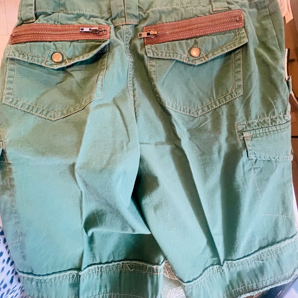 Two pairs Bermuda shorts.
